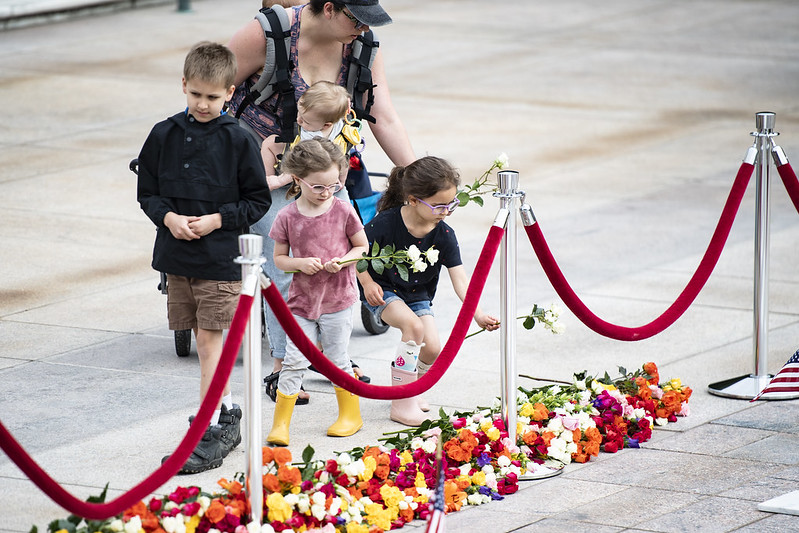 Children laying flowers